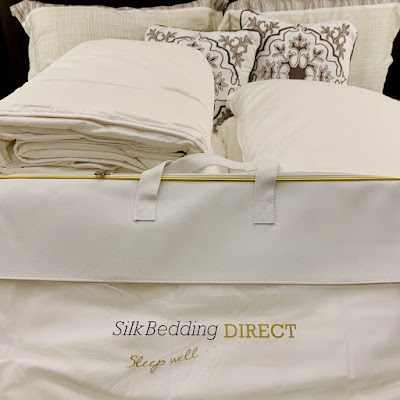 Silk duvet set on a bed.