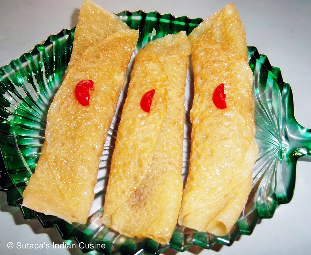 Patishapta/ Bengali Pancake with coconut stuffing