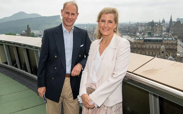 The Countess of Wessex wore a pleated silk midi skirt by Valentino. The Countess wore a pink skirt with white top and blazer