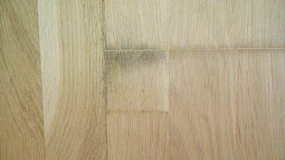 Mancha en multicapa de roble por microorganismos