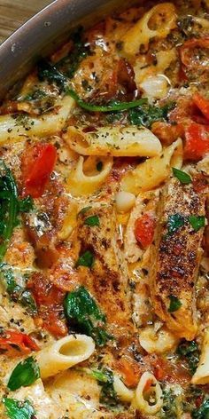 This chicken pasta with spinach and bacon in creamy tomato sauce is simply amazing with Parmesan cheese! 