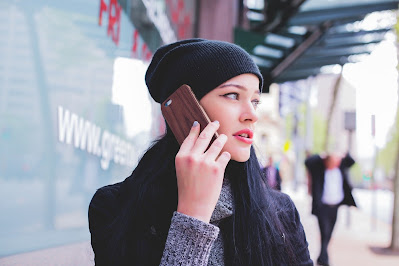 A girl is talking on the phone. Beautiful girl image.