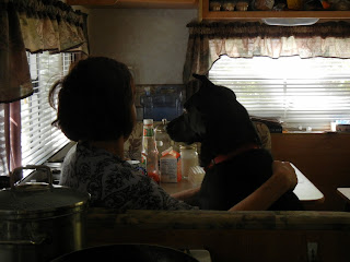 Pattie and Chloe enjoying breakfast in the travel trailer 