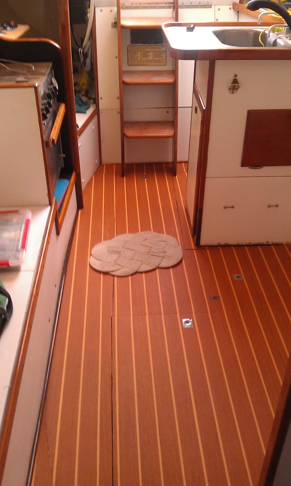 SV C'est la Vie Cabin Sole Refinishing installing floor hardware