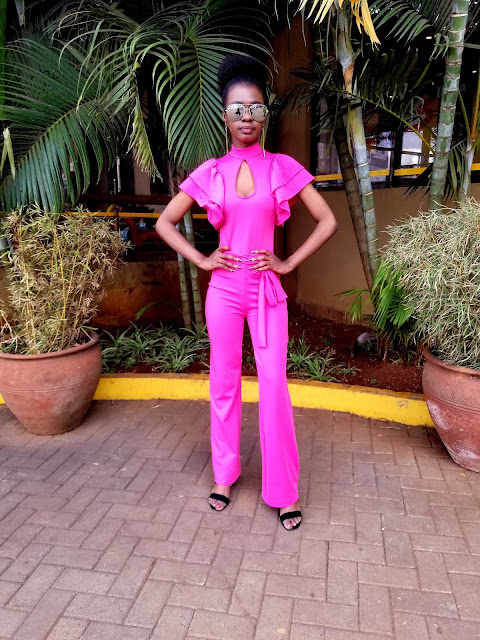 How To Pull Of A Jumpsuit That's Bright Pink