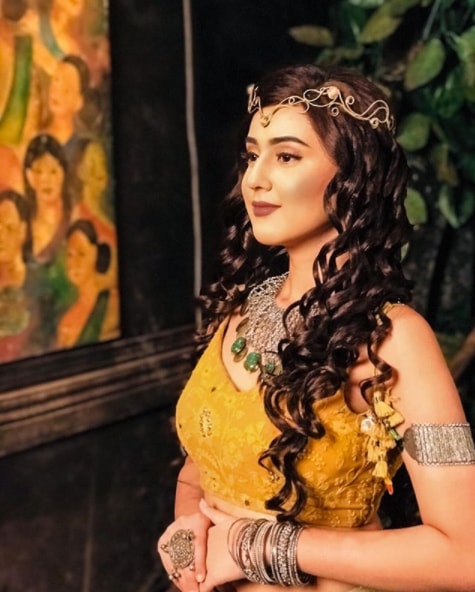 Riya Sharma in yellow dress looks like a princess