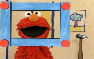 The frame moves to in front of Elmo and Elmo is framed. Sesame Street Elmo's World Building Things Elmo’s Question