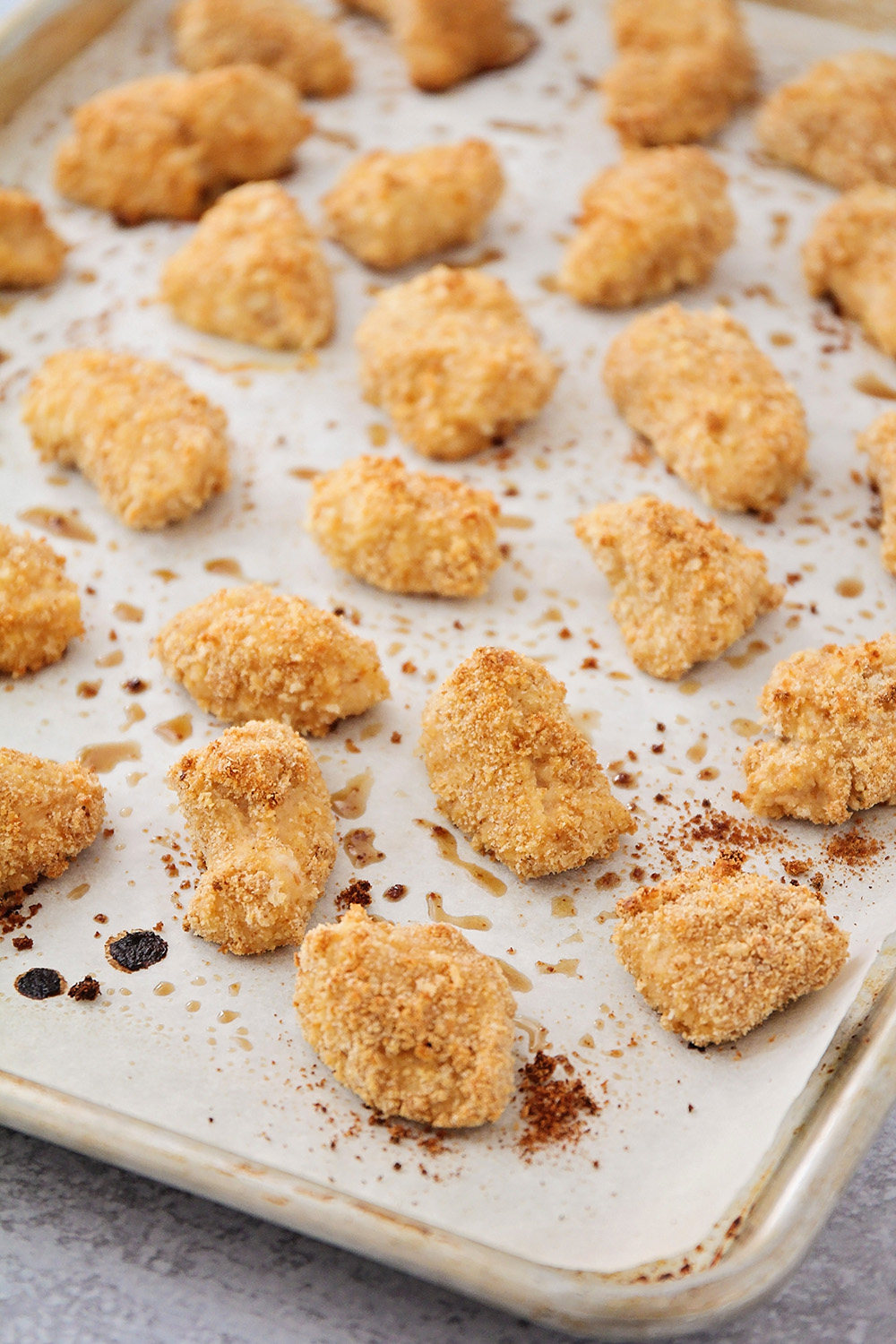 These crispy baked chicken nuggets are way healthier than fast food, and way more delicious!