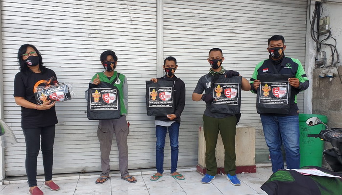 Sasar Pasar Tradisional dan Komunitas Ojol, KPU Denpasar Bagikan Souvenir Sosialisasi Pilkada