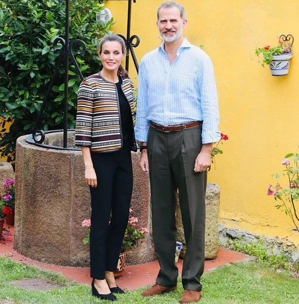 Queen Letizia wore a multicolor tweed jacket by Uterque, and Uterque high heel fabric shoes. gold earrings Boss sweater