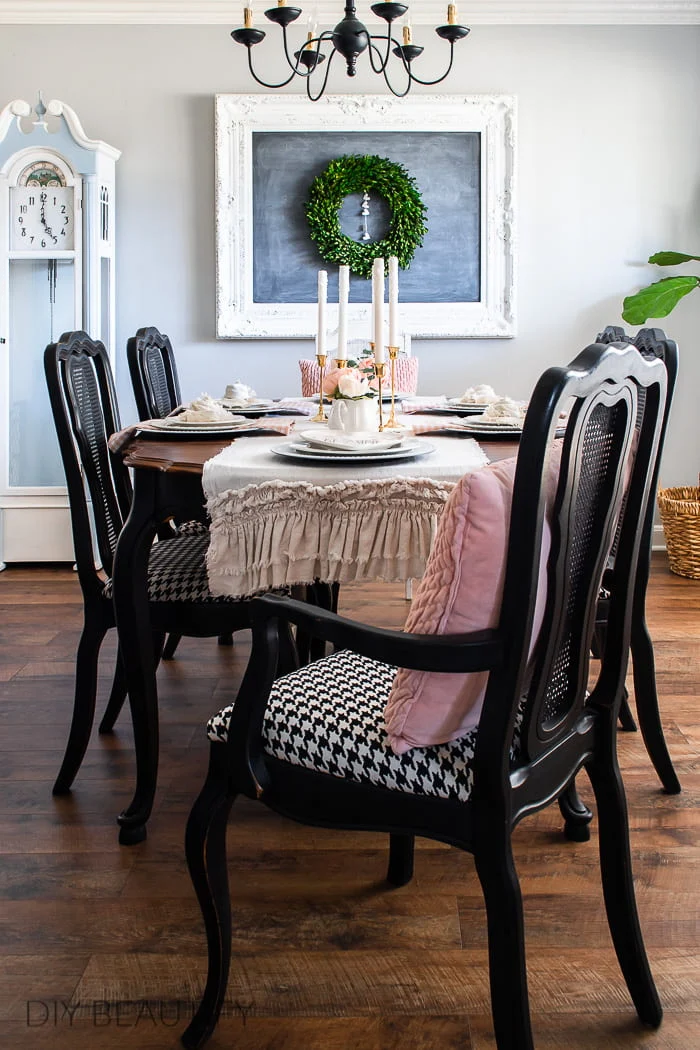 dining room with black and pink accents