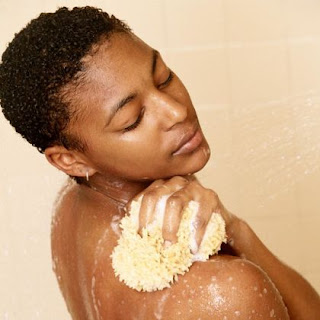 A woman taking her bath 