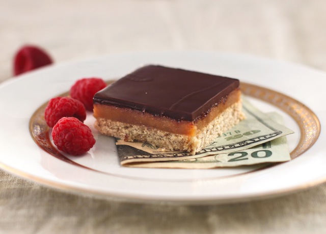 These delicious Healthy Millionaire's Shortbread Bars have a gluten free shortbread base, refined sugar free caramel filling, and dark chocolate topping! You'll feel like royalty with every bite!