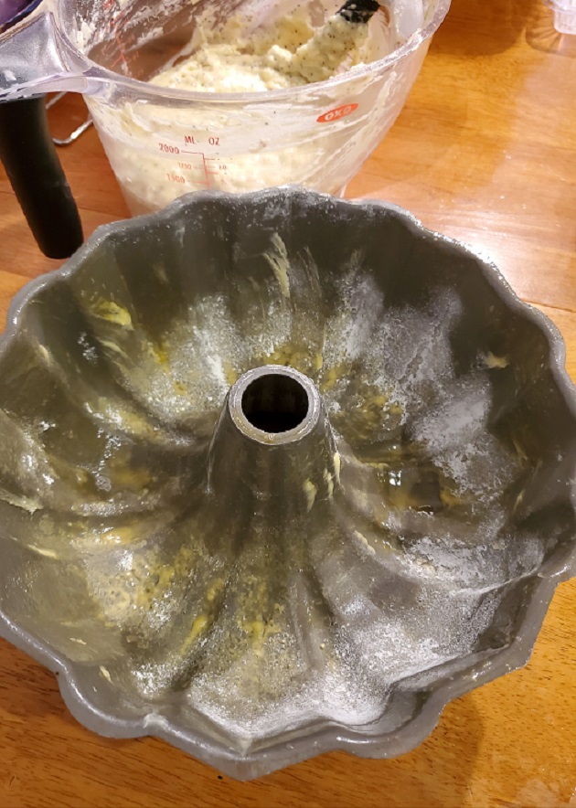 this is a silver colored non stick bundt pan floured and buttered to make a cake in