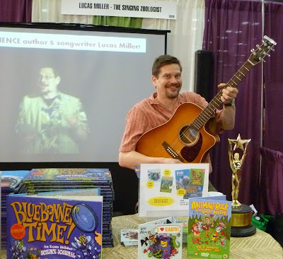 Lucas Miller with books, TLA 2011