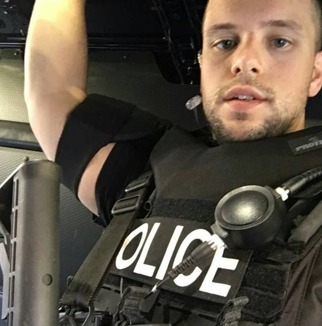 handsome-masculine-male-police-officer-black-uniform-selfie