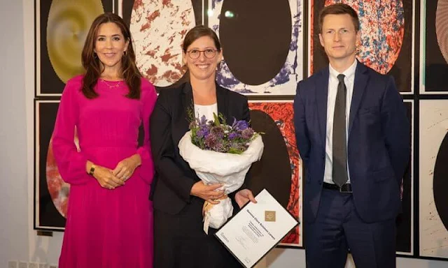 Crown Princess Mary wore a pink long sleeve pleated midi dress from No 21. Prada pumps