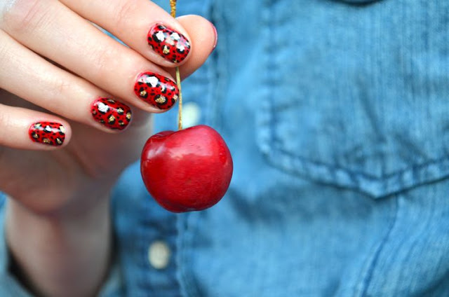 Cute Red Nails with Black and Golden Patterns