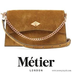 Kate Middleton carries METIER Roma small suede shoulder bag