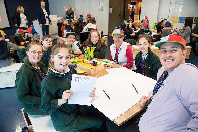 Photo of students at work at the event