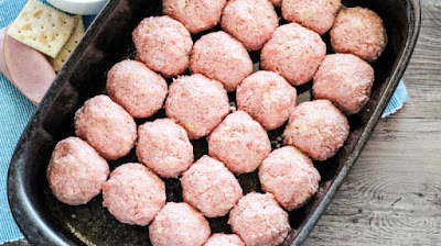 ham balls ready to bake raw ham balls formed and placed in pan, ready to bake