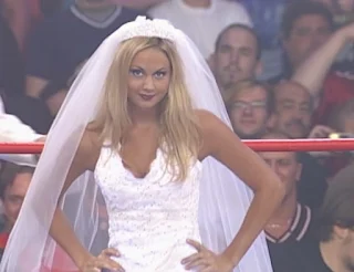 WCW Bash at the Beach - Ms Hancock (Stacy Keibler) faced Daffney in a wedding gown match