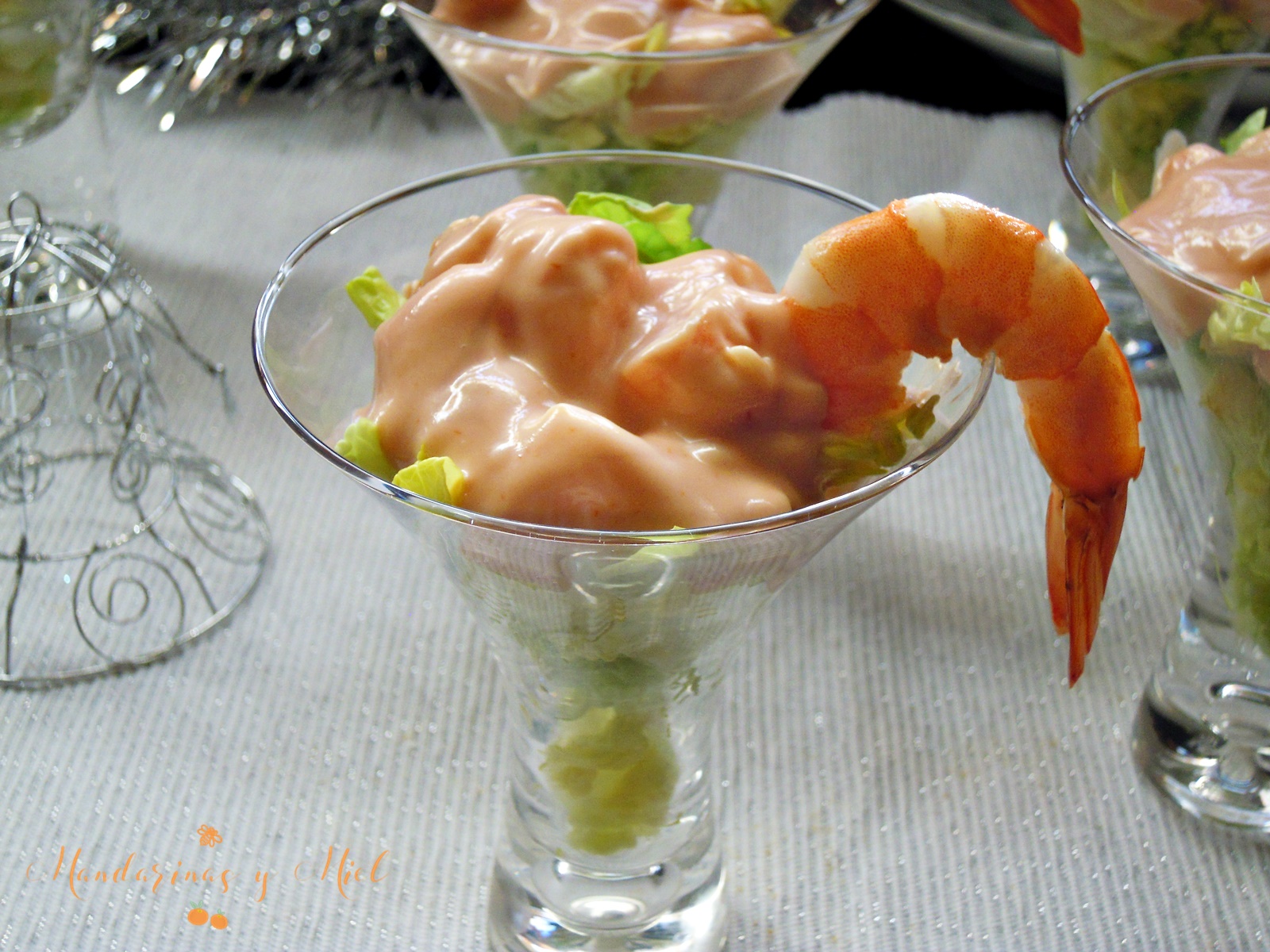 Cóctel de gambas o marisco Mandarinas y miel