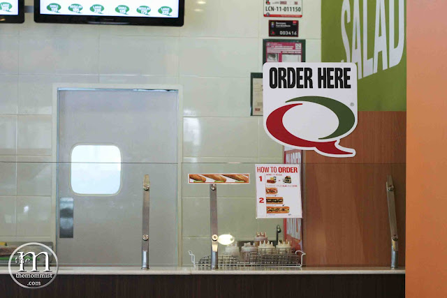 Quiznos order here signage