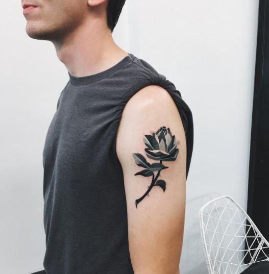 Rose tattoo on shoulder 