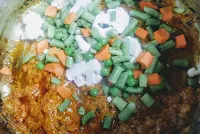 Chopped vegetables cooking for veg biryani recipe