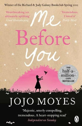 Front page of a book. Large text reading the title 'Me Before You'. A black silhouette of a woman releasing a bird into flight. Below is the authors name 'Jojo Moyes' dotted around the image are quoted reviews of the book.