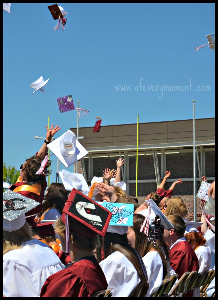 Graduated! Caps being thrown in the air.