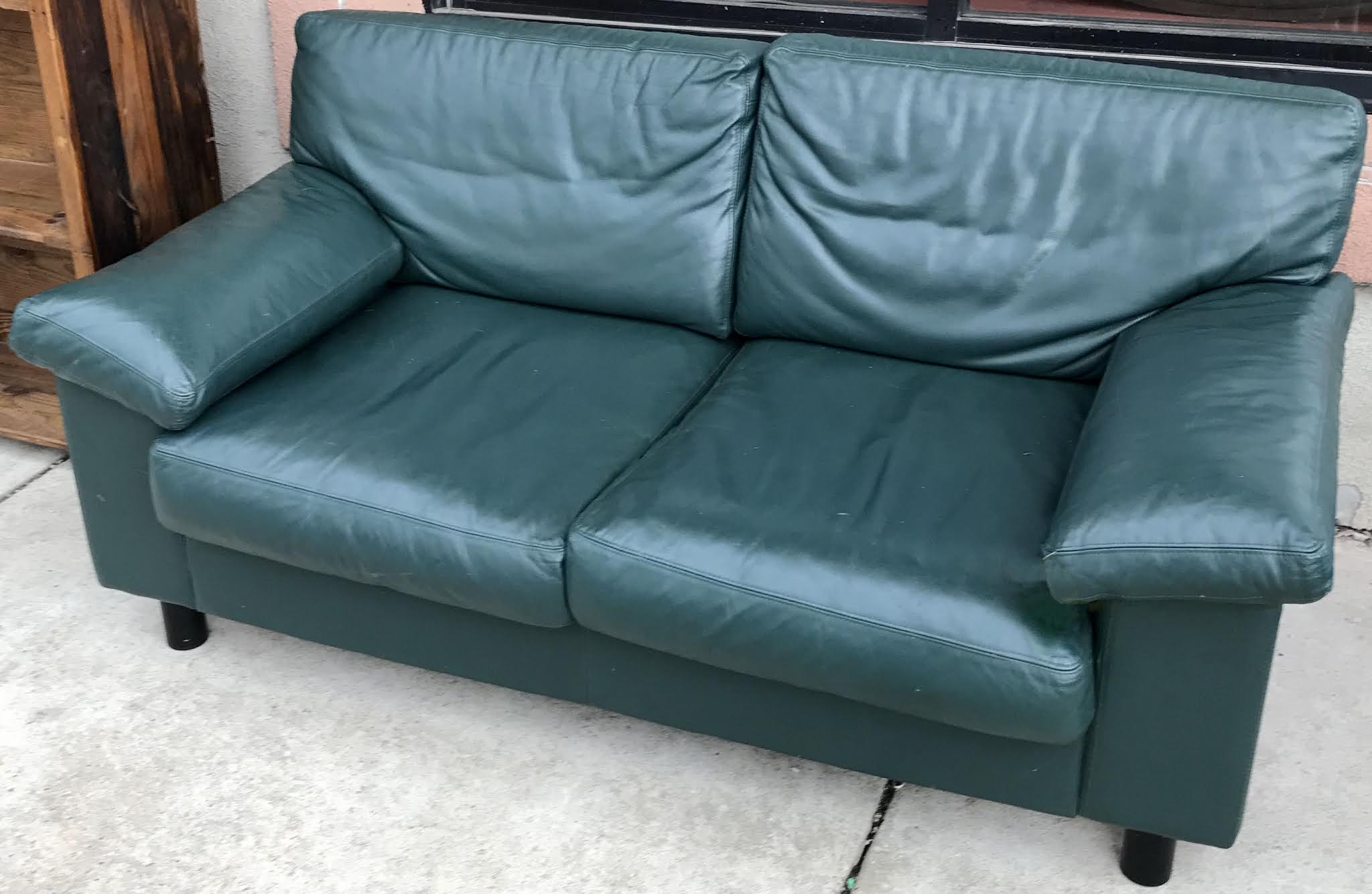 Uhuru Furniture & Collectibles Dark Green Leather Loveseat 175 SOLD