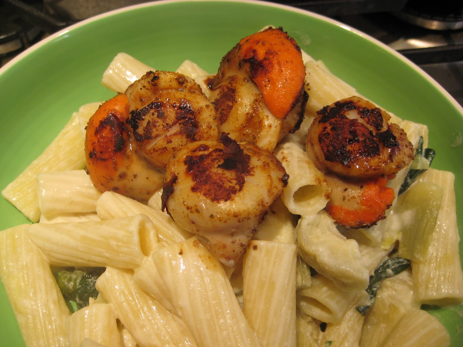 Lemon and Cheese Scallops with Spinach Artichoke Pasta