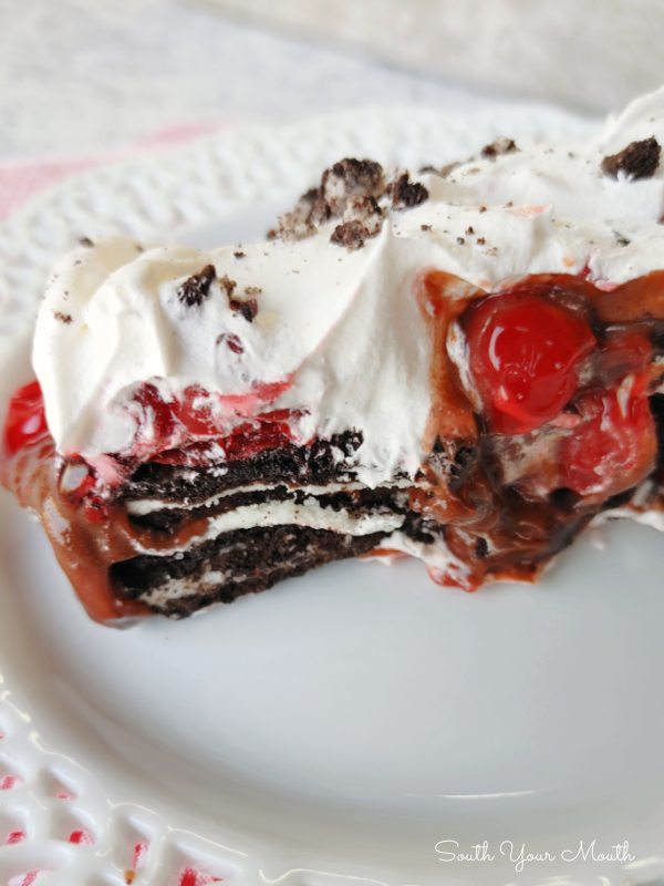 Black Forest Oreo Dessert! A decadent no-bake icebox dessert recipe layered with Oreo cookies, chocolate pudding and cherry pie filling that's super quick and easy to make!