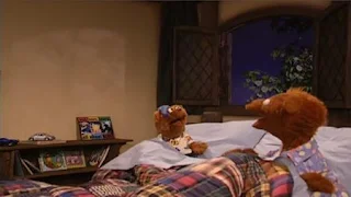 Cousin Bear is staying at Baby Bear's house. Cousin Bear sees a tree's shadow on the wall and he fears that it is the Boogey Bear. Sesame Street Bedtime with Elmo