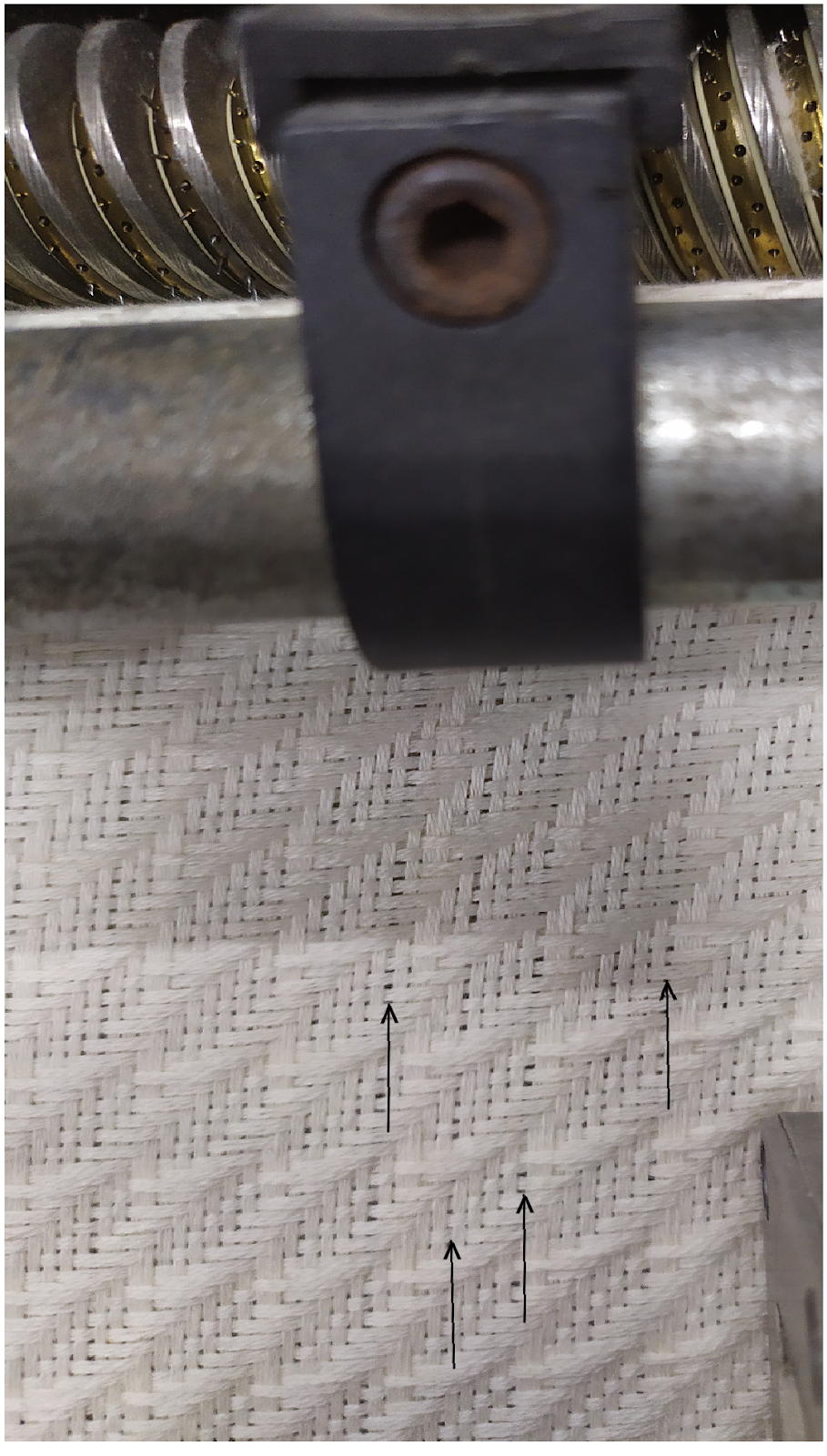 Textile Adviser TEMPLE MARKS IN THE FABRIC, A FABRIC DEFECT, CAUSES