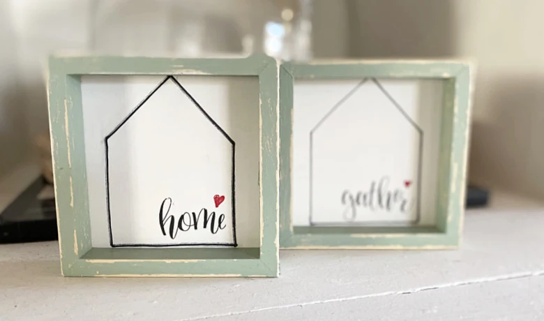 home and gather signs with green frames