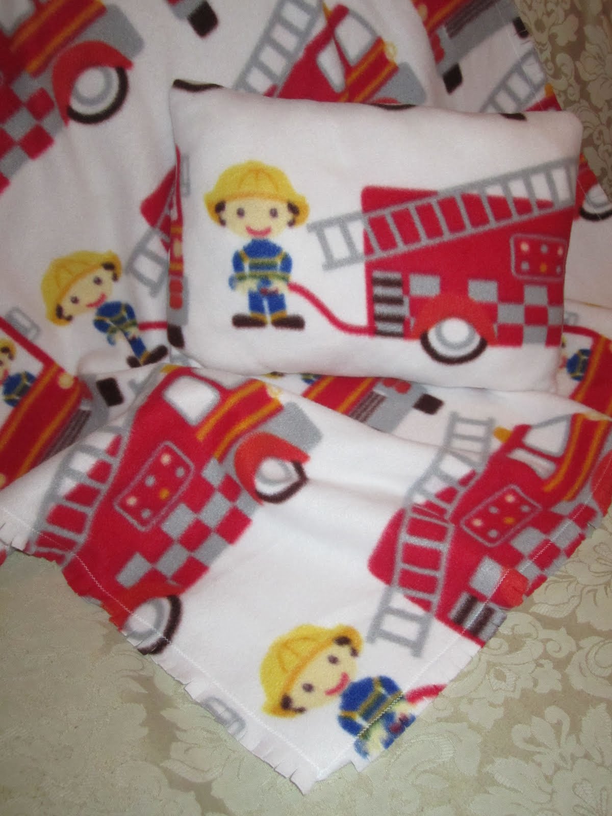 The Loopy Stitcher Baby Blanket and Pillow Fireman Theme