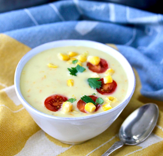 Golden Tomato Soup with Corn, Cherry Tomatoes, and Herbs