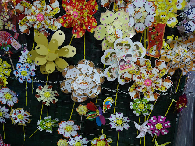 various pinwheels including several with dog themes