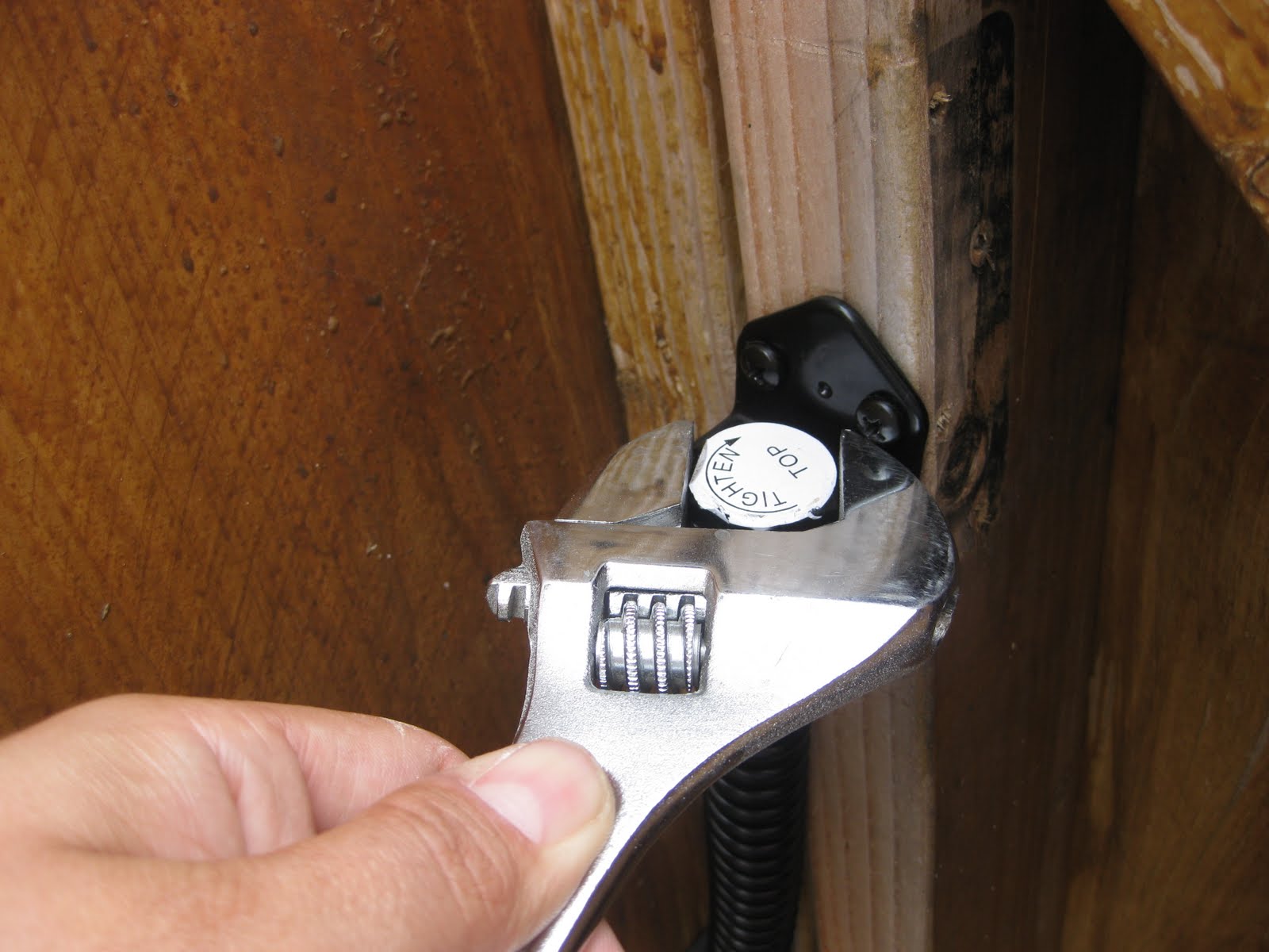 Homeowners and DIYers Installing a gate spring
