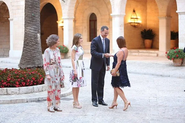 Queen Letizia and Former Queen Sofia host a dinner at the Almudaina Palace in Palma de Mallorca. Letizia wore Juan Vidal Floral dress, Malababa bag, Magrit sandals, Tous earrings