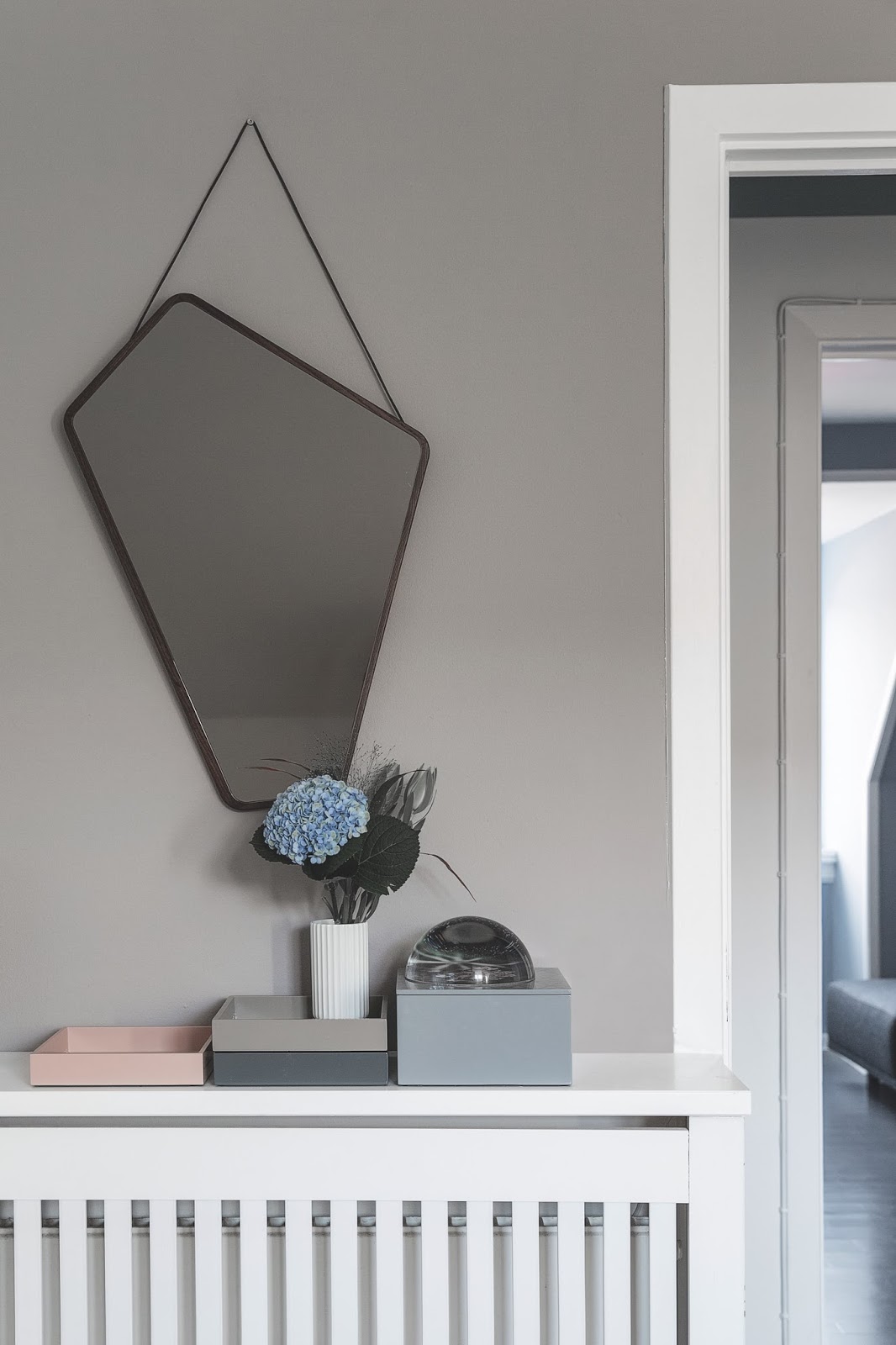 Image showcasing A Scandinavian Penthouse Apartment with Slanted Ceilings