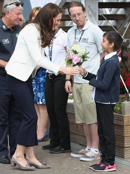 Duchess Catherine of Cambridge attends the 1851 Trust charity's Roadshow. Kate Middleton wore J. Crew Avery Heels