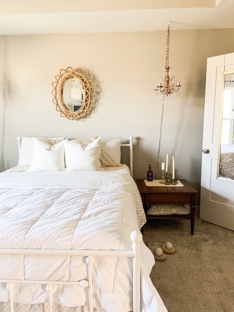 natural bedroom with glam touches