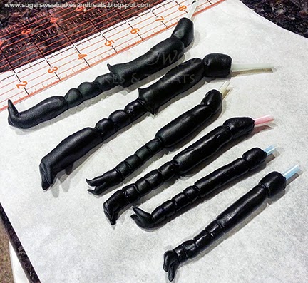 All 6 beetle legs made with fondant and plastic straws