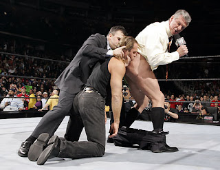 [Image: VinceMcMahonAssKissing.jpg]