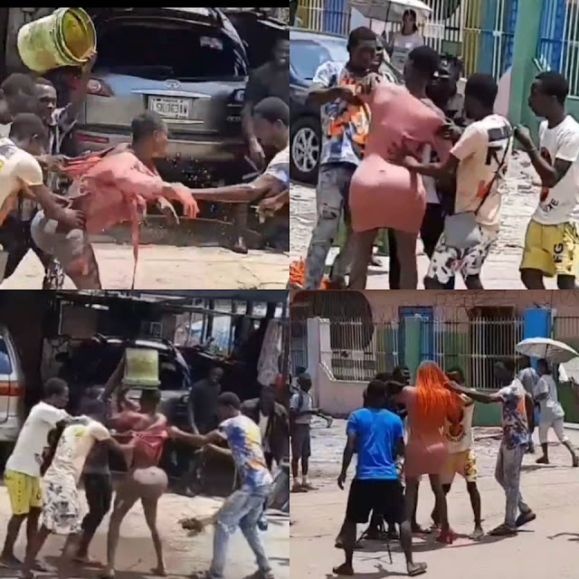 Watch the Moment a Crossdresser was beaten mercilessly by Area Boys in Lagos (Videos)