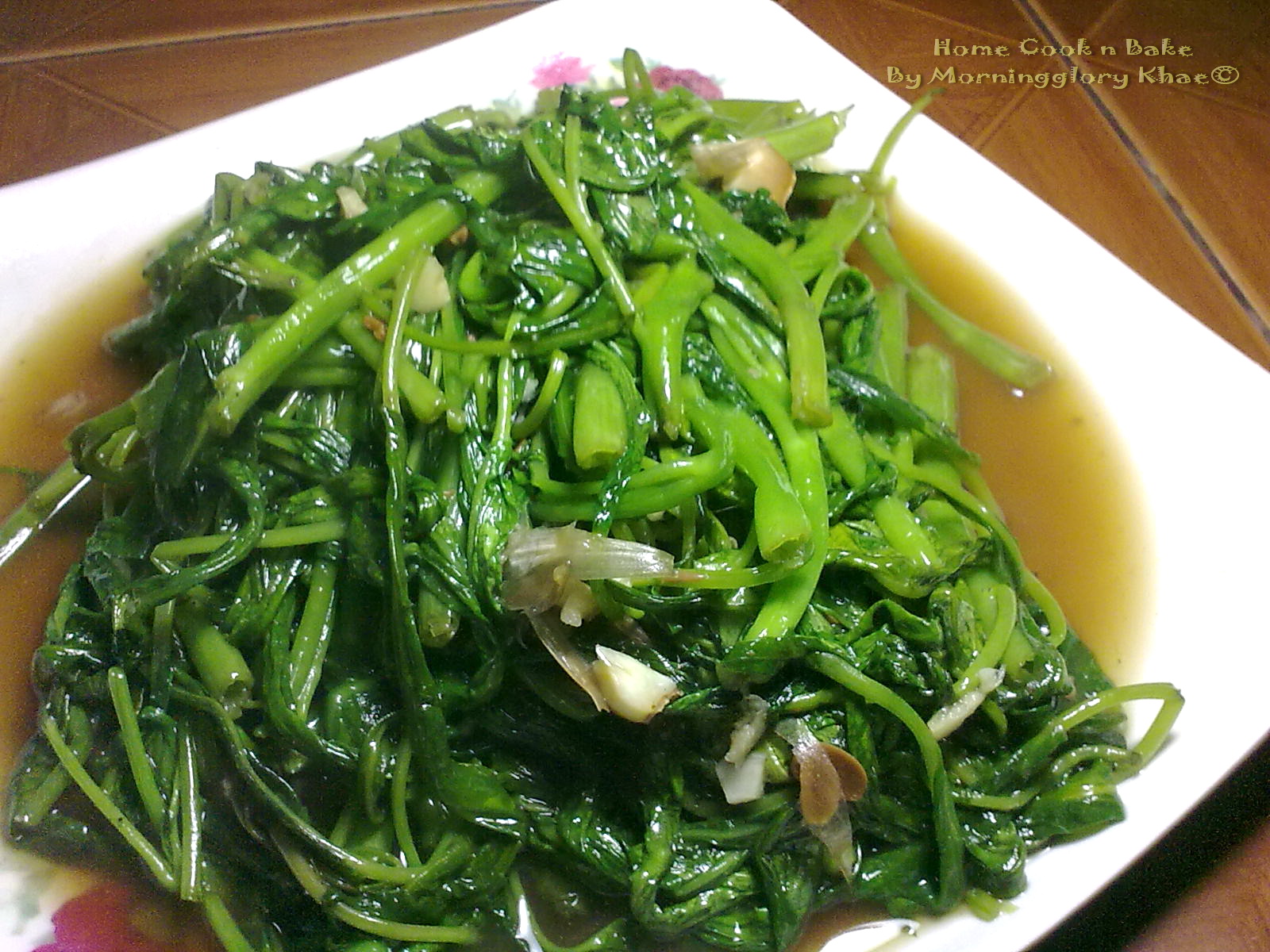 ผัดผักบุ้งไฟแดง Stirfried morning glory with oyster sauce Cook n